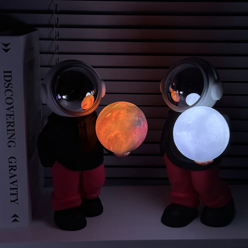 Creative Astronaut Bluetooth Speaker with 3D Starry Sky Lighting (grey top + navy blue pants)